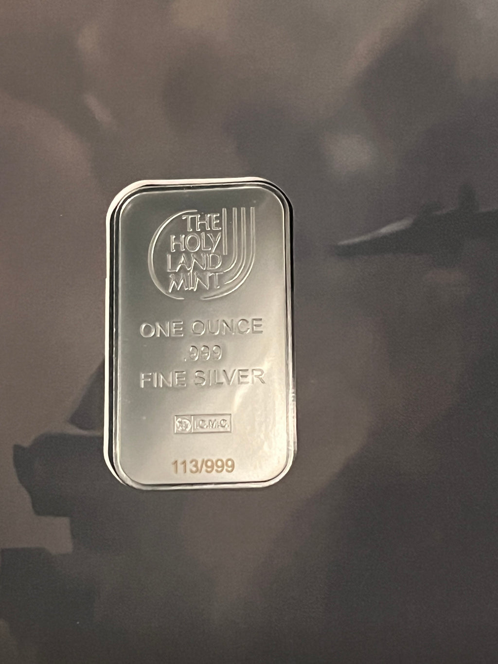 1-ounce .999 fine silver art bar produced by The Holy Land Mint. 111/999